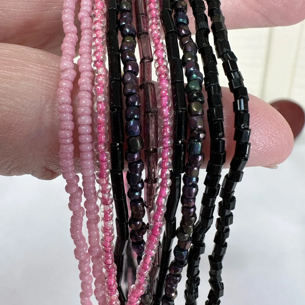 Pink and black multi strand necklace